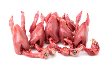 quail ready for cooking on a white background