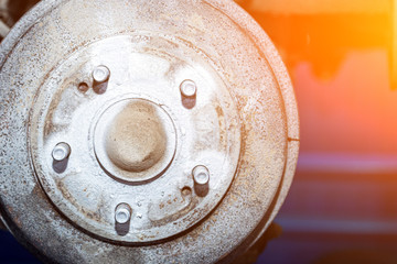 Close-up of a car hub, drum brakes, brake pads, brake disc prepared for repair. Work at the tire workshop