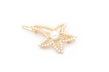 Fototapeta na wymiar Luxury star shape hair clip on white isolated background.