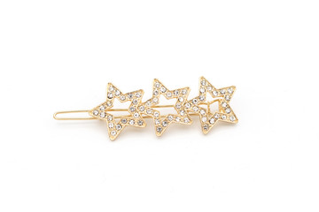 Luxury star shape hair clip on white isolated background.