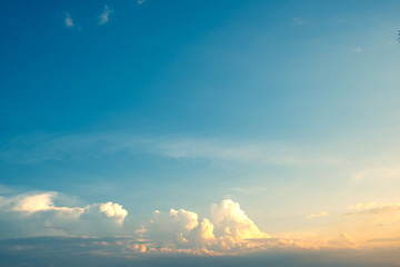 Abstract landscape nature background of sky with clouds in sunset.