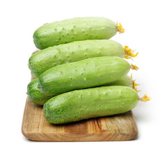 Green cucumber on the white background 