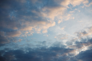 Blue sky, pink clouds, sunset.
