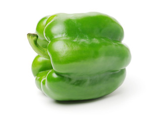 fresh green bell pepper (capsicum) on a white background