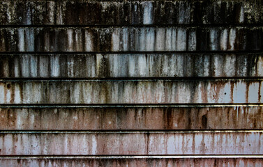 Background texture stained stucco old black gray. White brick wall background color in a rustic room. Grungy rust block of stone. Old wallpaper architecture used for general work.