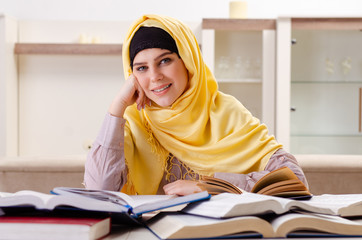 Female student in hijab preparing for exams