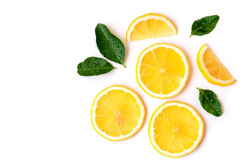 Fototapeta na wymiar Fresh sliced yellow lemon lime fruit with green leaf isolated on white background. Top view. Flat lay. Space for text.