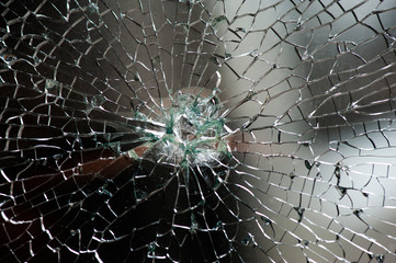 Naklejka na ściany i meble Automotive glass or car windshield broken and damage from accident
