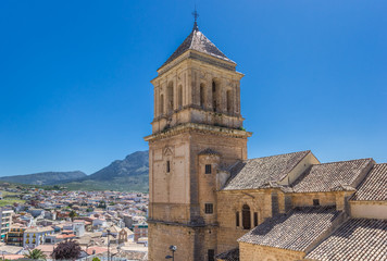 Fototapeta na wymiar Church tower and surrounding landscape of Alcaudete