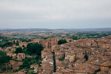 Fototapeta premium Panoramic view of Siena city with historic buildings and streets