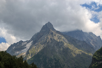 Naklejka na ściany i meble Panorama view on mountains scene in national park of Dombay, Caucasus