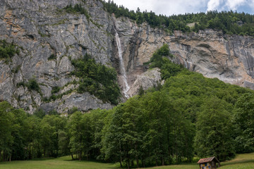 View closeup waterfall Staubbach fall in mountains, valley of waterfalls