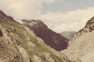 Panorama of mountains on route of Trift Bridge in national park Switzerland