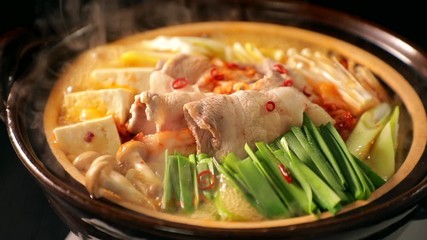 キムチ鍋 KIMCHI hot pot on black background - Powered by Adobe