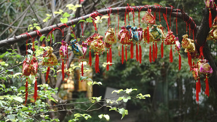 Chinese lucky ornaments at street market in Jilin Old Town of Chengdu, China. The lucky decor with chinese character wishes.                    