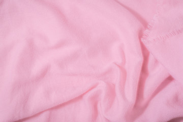 Pink Scarf fabric texture. Winter concept. Flat lay, top view, copy space