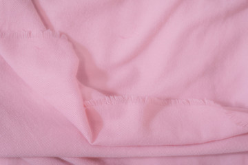 Obraz na płótnie Canvas Pink Scarf fabric texture. Winter concept. Flat lay, top view, copy space