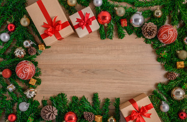 Christmas fir tree with decoration on wooden board