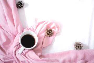 Obraz na płótnie Canvas Christmas composition. Cup of coffee, scarf on pink background. Christmas, winter concept. Flat lay, top view, copy space