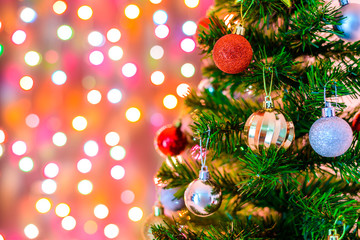 Christmas decoration star and balls Hanging on pine branches christmas tree