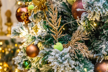 Fototapeta na wymiar Photo of beautiful New Year toys with green tree