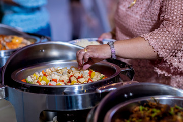 Food Buffet Catering Dining Eating Party Sharing Concept.people group catering buffet food indoor in luxury restaurant with meat colorful fruits and vegetables