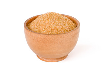 Closeup brown sugar in wooden spoon isolated on white background . Unhealthy diet ,awareness and stop diabetes concept. Top view. Flat lay.