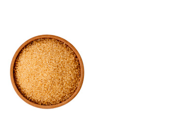 Closeup brown sugar in wooden spoon isolated on white background . Unhealthy diet ,awareness and stop diabetes concept. Top view. Flat lay.