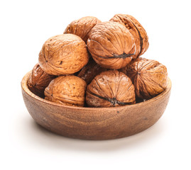 Bowl with tasty walnuts on white background