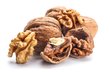 Tasty walnuts on white background