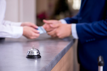 Hotel reception bell at the counter