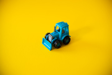 Toy blue agricultural tractor