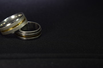 Two rings of gold and white gold are elegant and expensive and are a fine work for teenagers.