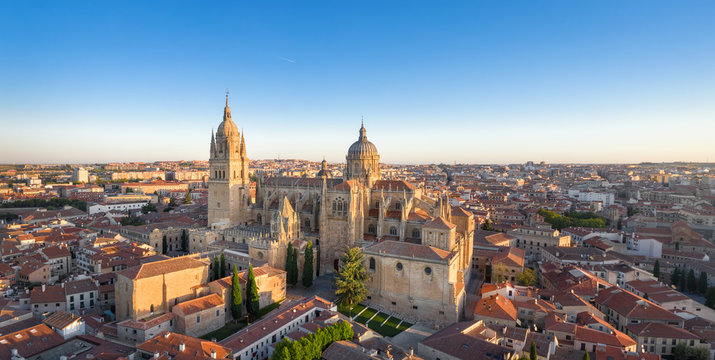 Panoramic aerial cityscape of Salamanca, Spain with building of New Cathedral on sunrise