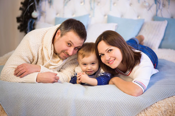 Fototapeta premium Beautiful family enjoying their holiday time together and having fun