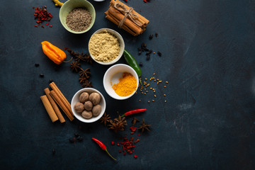Dark food background with spice top view