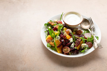 Fresh baked beets salad with orange and blue cheese