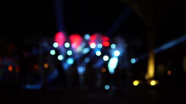 Entertainment concept, blurred party, bright stage and color bokeh lights. Nightlife.