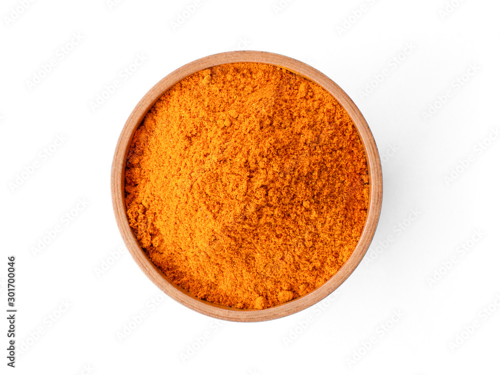 Poster Closeup turmeric ( known as curcumin, Curcuma longa Linn) powder in wooden bowl isolated on white background with clipping path.Top view. Flat lay.