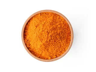 Fotobehang Closeup turmeric ( known as curcumin, Curcuma longa Linn) powder in wooden bowl isolated on white background with clipping path.Top view. Flat lay. © NIKCOA