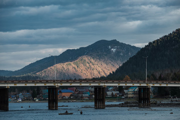 Teletsky mountain lake in Altay with blue autumn sky
