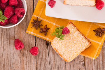 Lemon sponge cake with pomegranate.	