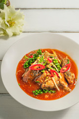 spicy sardines fish in tomato sauce