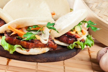 Gua bao, steamed buns with pork belly and vegetable