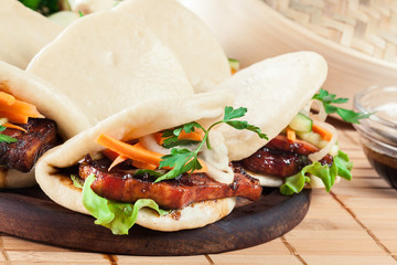 Gua bao, steamed buns with pork belly and vegetable