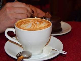 cup of coffee on wooden table
