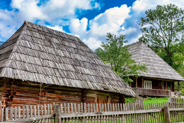 Fototapeta na wymiar Wooden houses in Ukrainian village