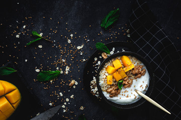 Bowl of homemade granola with yogurt and cereals