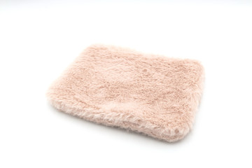 Pink fur bag on white isolated background.