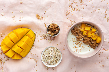 Bowl of homemade granola with yogurt and cereals